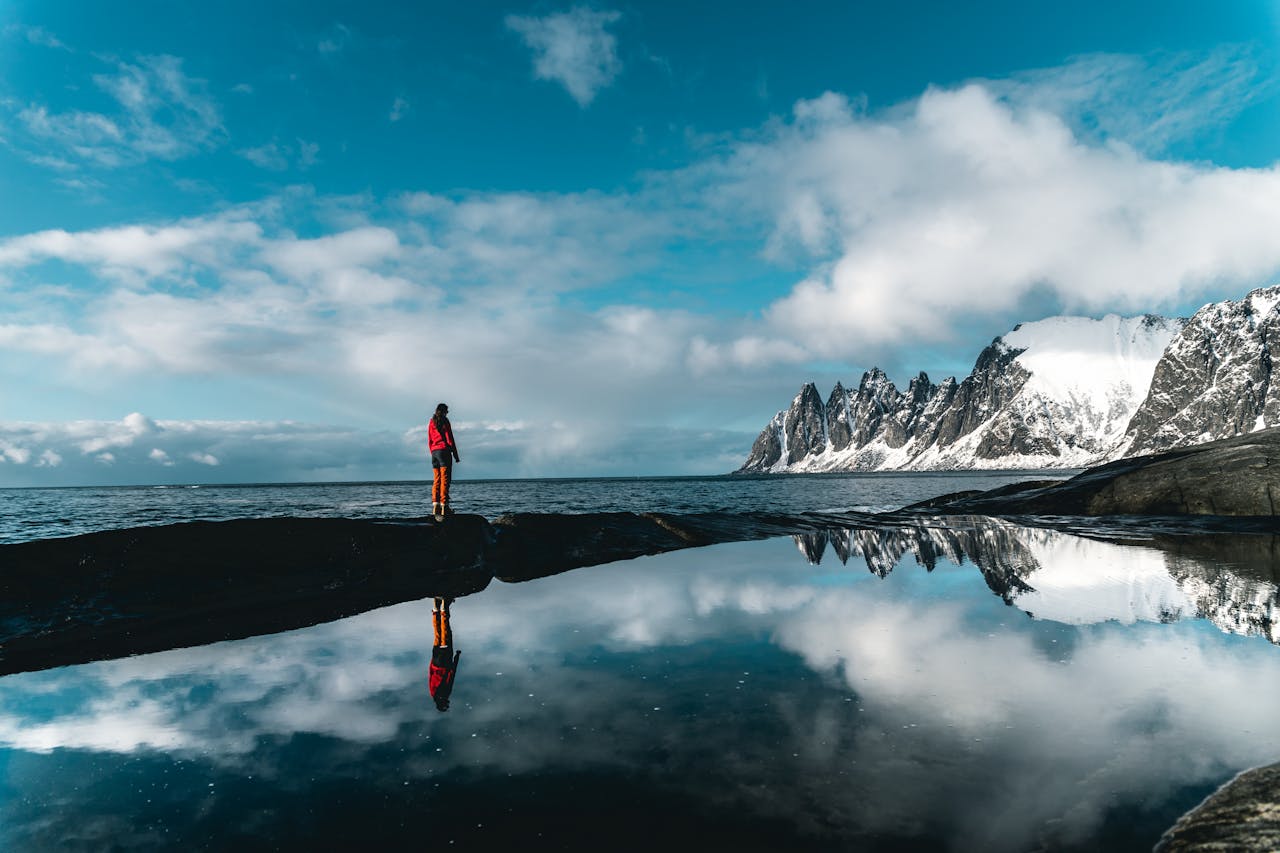 Photo by Tobias Bjørkli: Person on Body of Water